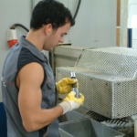 Austrian trainee working on a turning machine, June 2008